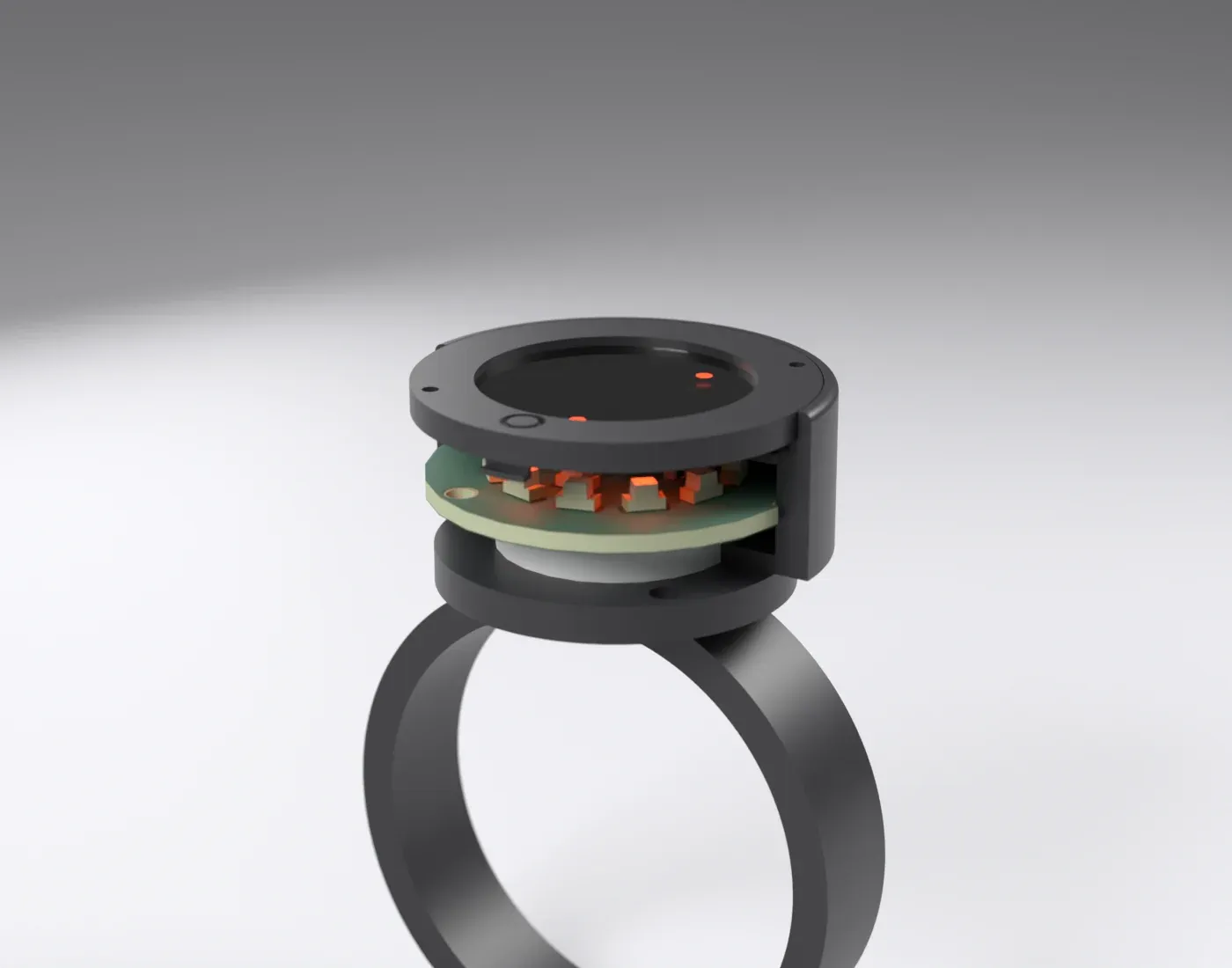 A cutaway of the assembled round watch on its ring, showing the board and battery inside