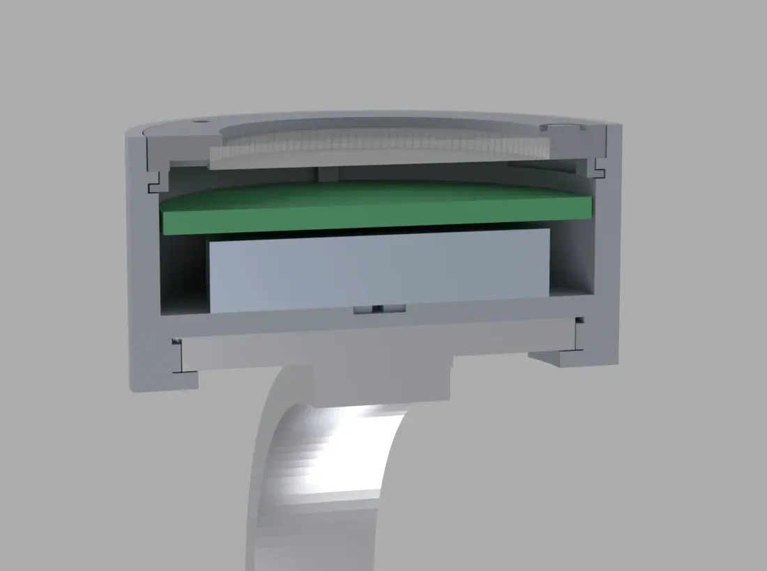 Cross-section of the case with the bigger cell under the board and the twist-lock ring below
